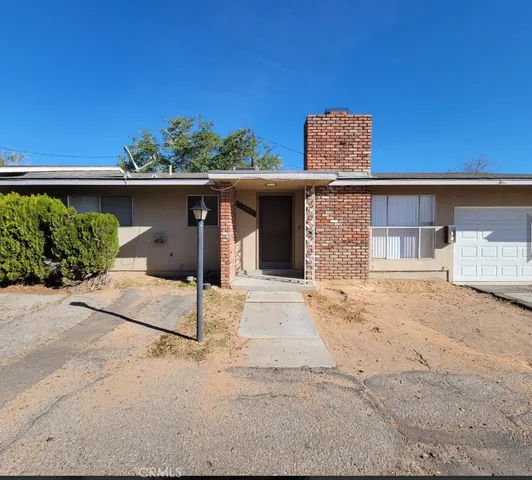 a front view of a house with entryway
