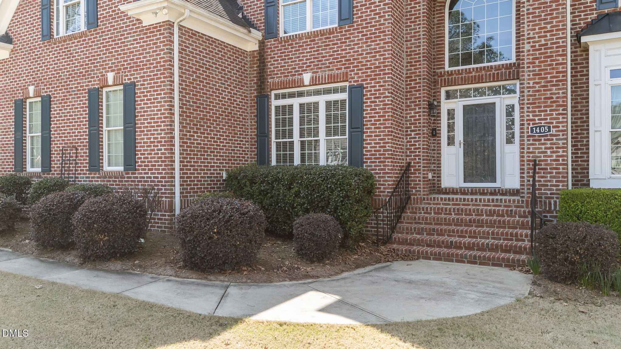 1405 Wakefield Farm Road Zebulon, NC 27597 - Photo 13 of 64 a view of a house with a yard and a chair
