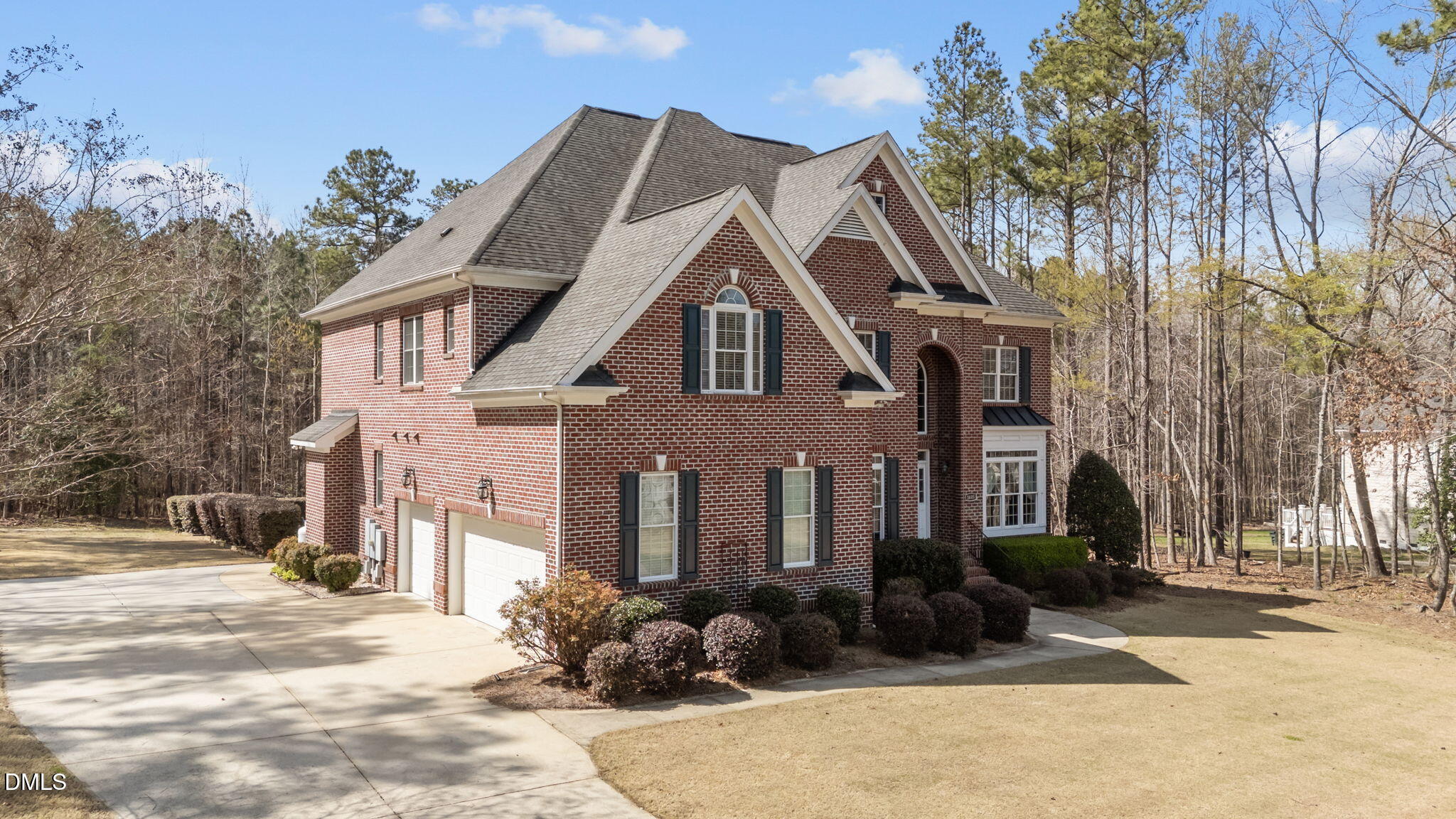 1405 Wakefield Farm Road Zebulon, NC 27597 - Photo 2 of 64 a front view of a house with a yard