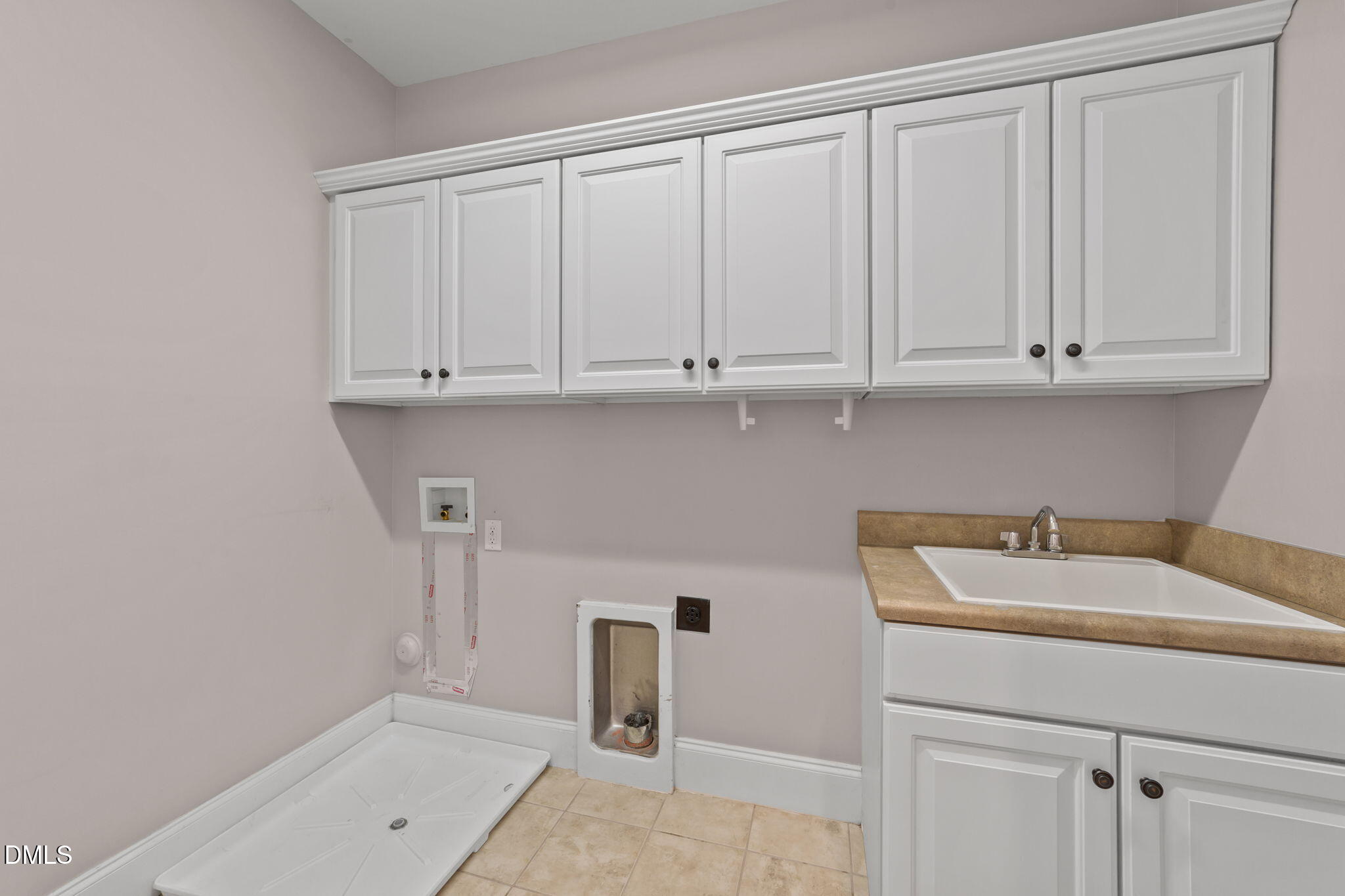 1405 Wakefield Farm Road Zebulon, NC 27597 - Photo 34 of 64 Laundry room upstairs