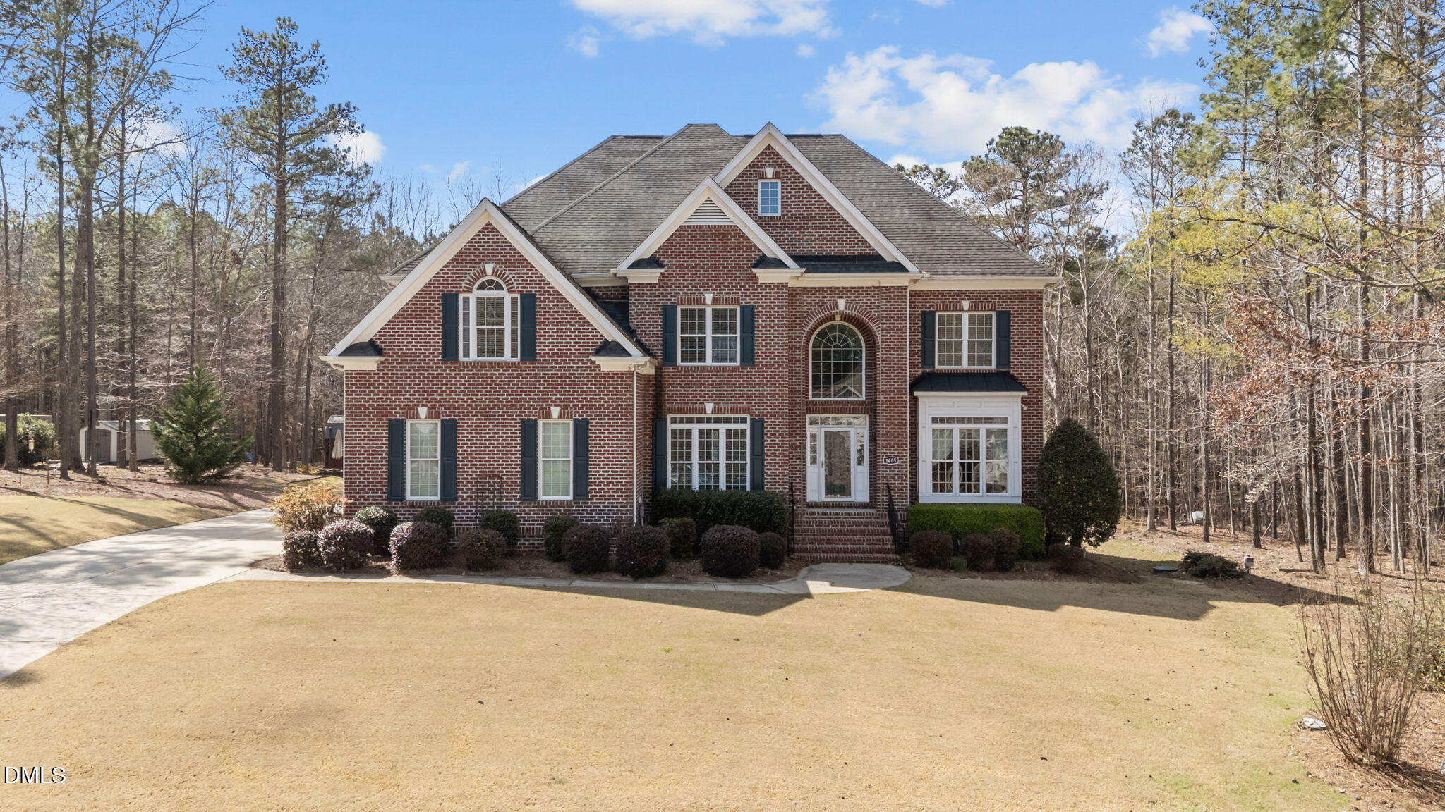 1405 Wakefield Farm Road Zebulon, NC 27597 - Photo 3 of 64 a front view of a house with a yard