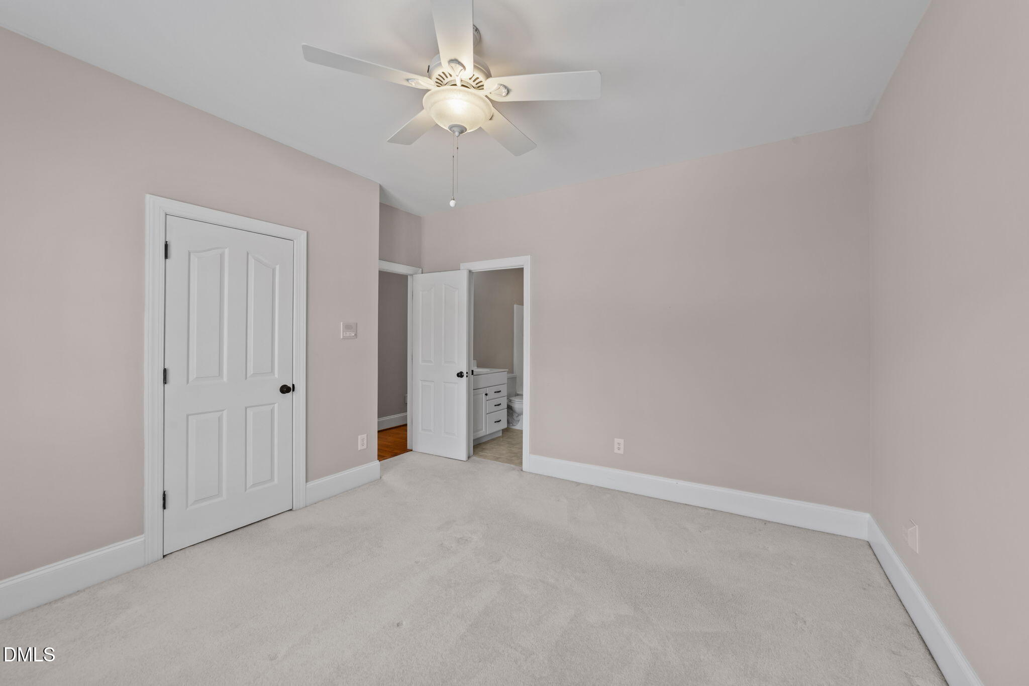 1405 Wakefield Farm Road Zebulon, NC 27597 - Photo 44 of 64 a view of an empty room with a chandelier fan