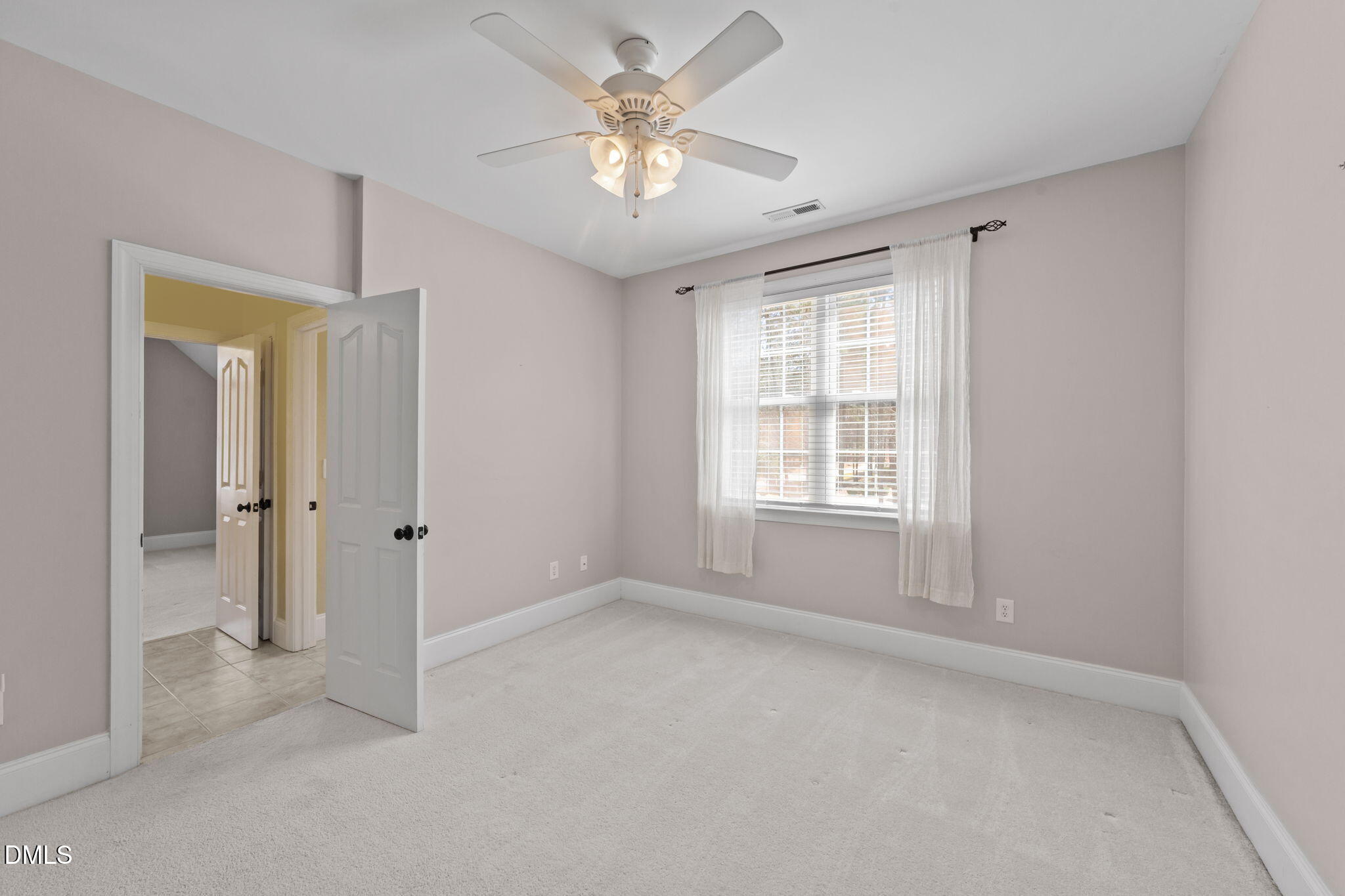 1405 Wakefield Farm Road Zebulon, NC 27597 - Photo 46 of 64 a view of an empty room with a window