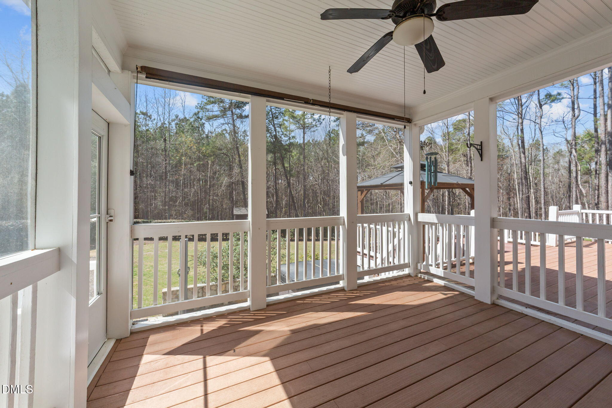1405 Wakefield Farm Road Zebulon, NC 27597 - Photo 60 of 64 a view of a porch with wooden floor and outdoor space