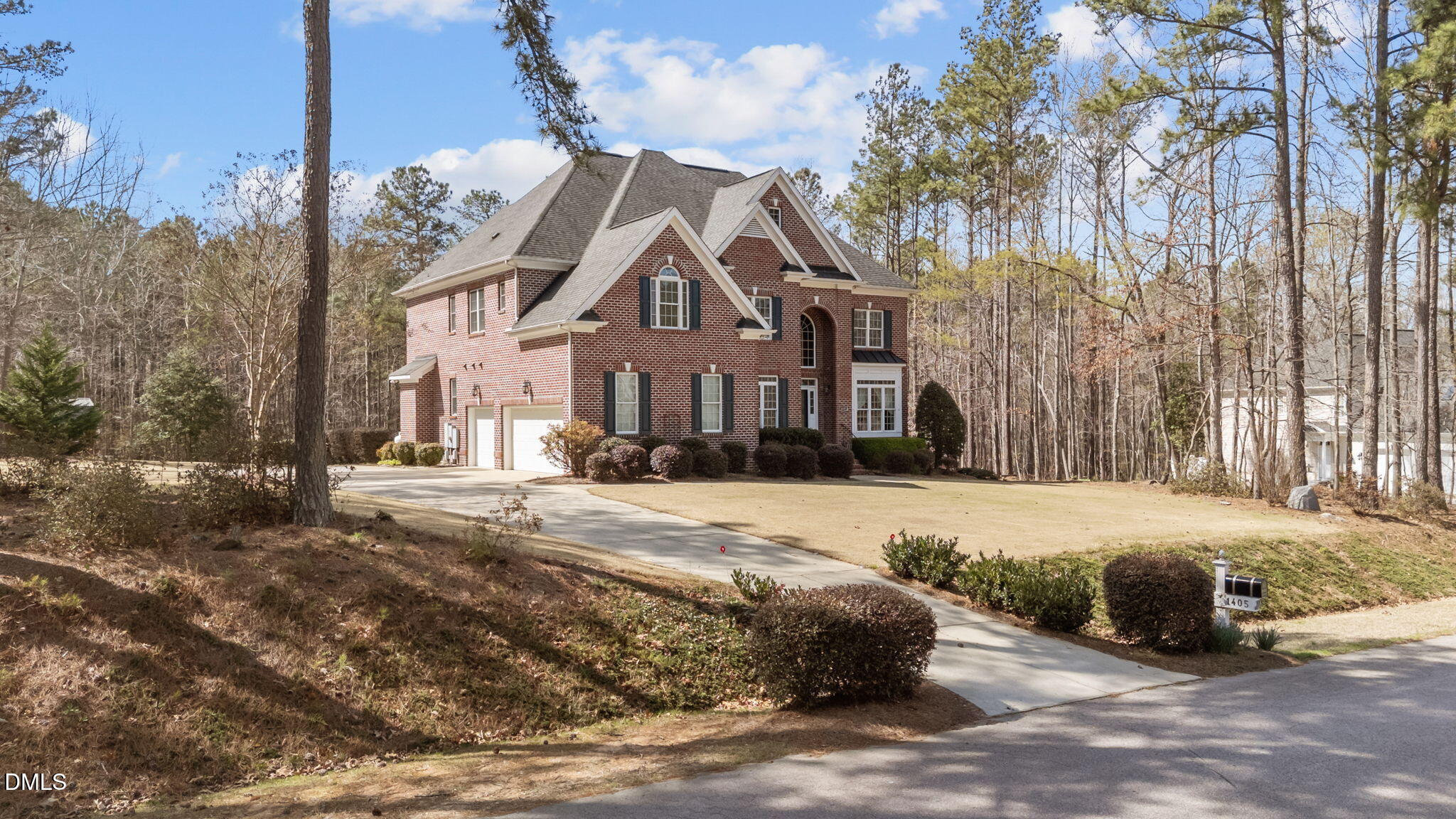 1405 Wakefield Farm Road Zebulon, NC 27597 - Photo 6 of 64 a view of a house with a snow in the yard