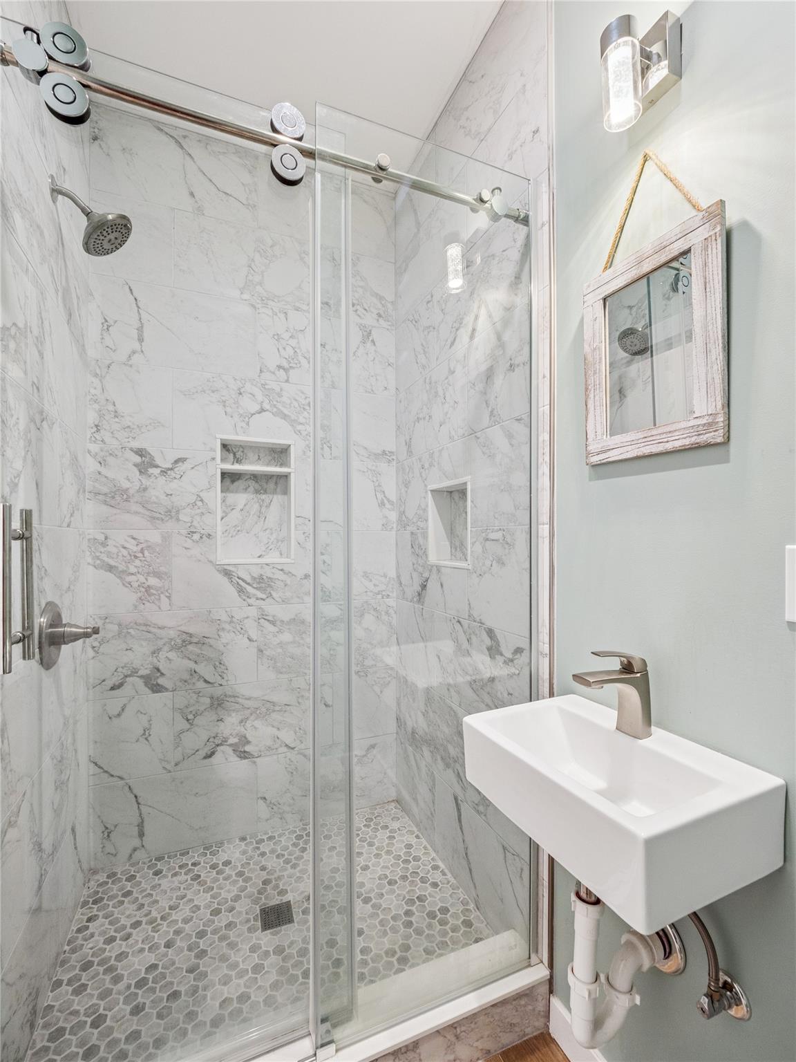 2680 Highway 9 Cold Spring, NY 10516 - Photo 16 of 29 a bathroom with a sink shower and a mirror