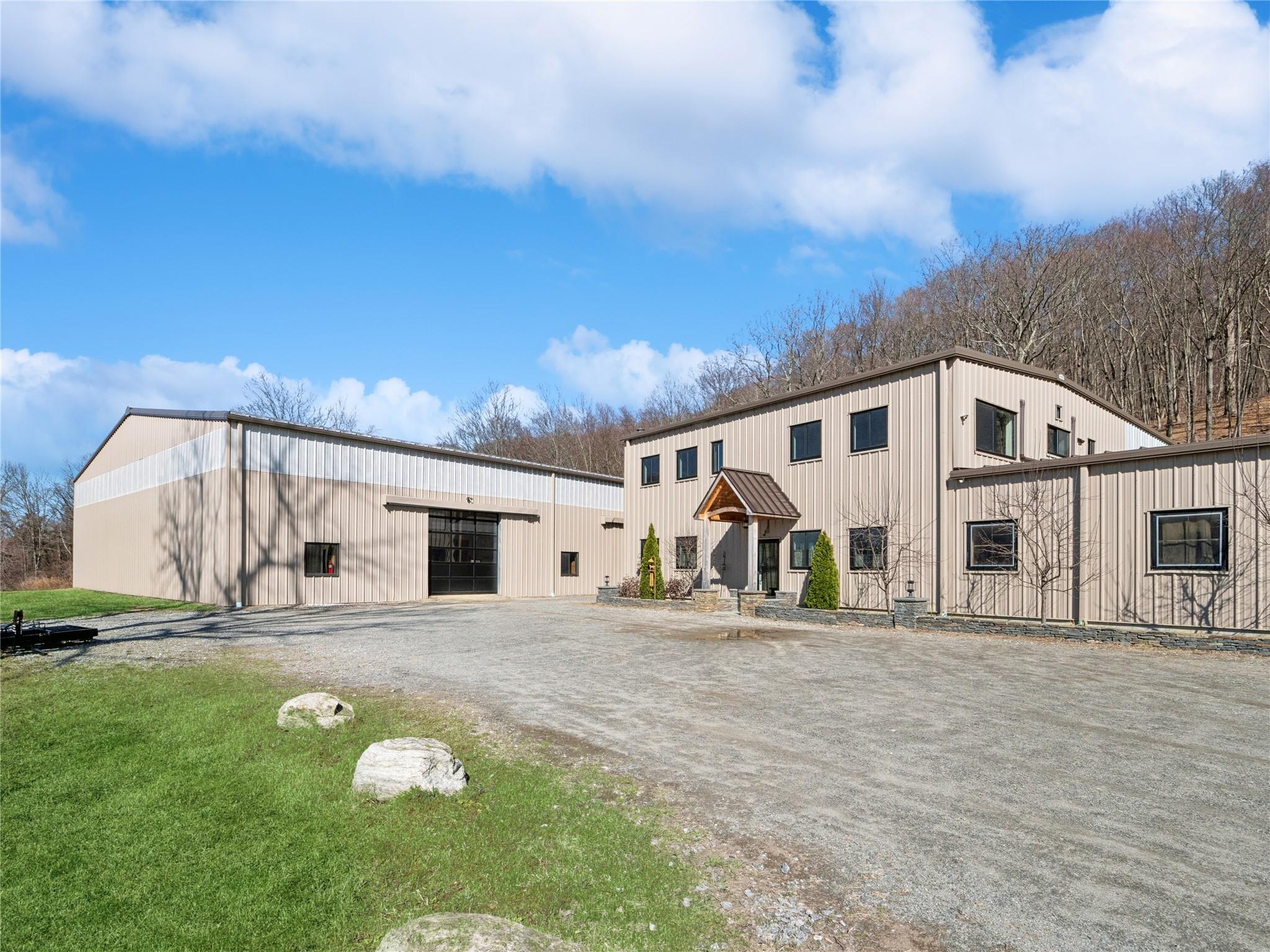 2680 Highway 9 Cold Spring, NY 10516 - Photo 23 of 29 a backyard of a house with table and chairs