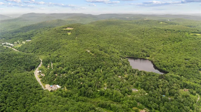 a view of a lake with a yard