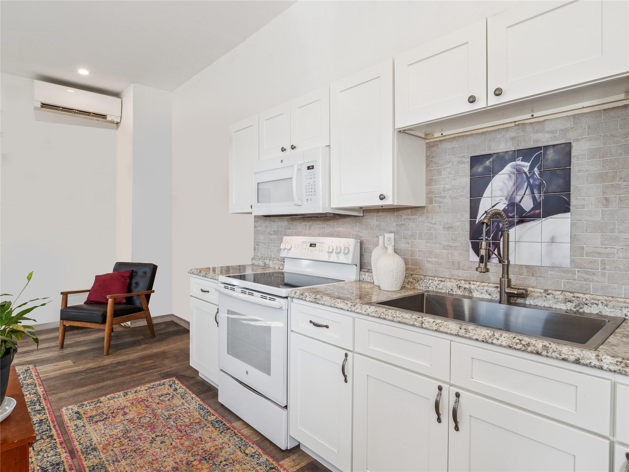 2680 Highway 9 Cold Spring, NY 10516 - Photo 5 of 29 a kitchen with a sink stove and cabinets