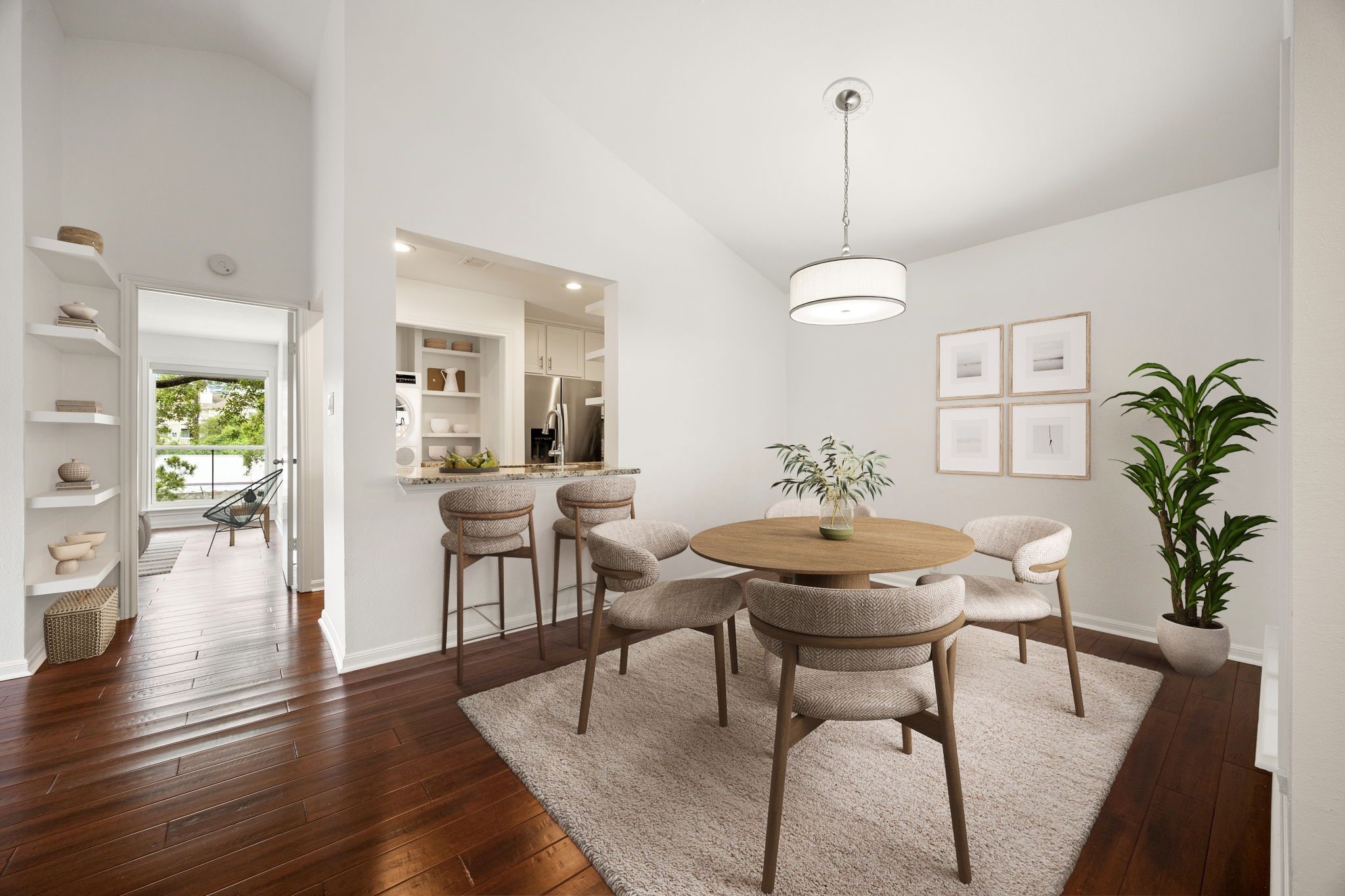 2829 Timmons Lane, Unit 130 Houston, TX 77027 - Photo 5 of 23 a dining room with furniture potted plants and wooden floor