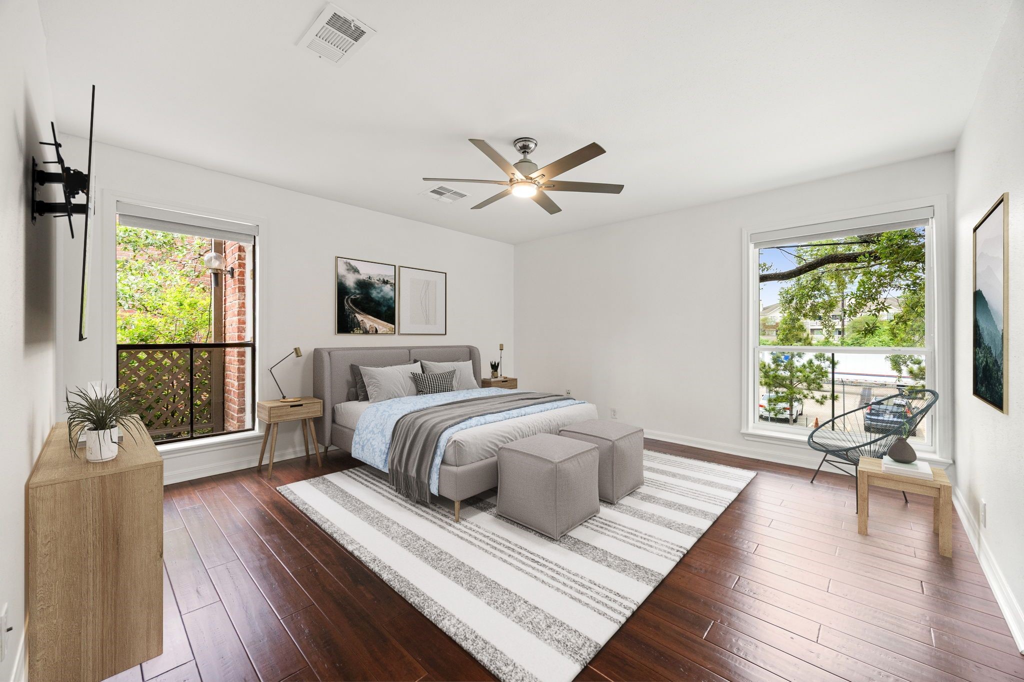 2829 Timmons Lane, Unit 130 Houston, TX 77027 - Photo 9 of 23 a bedroom with a large bed and a large window