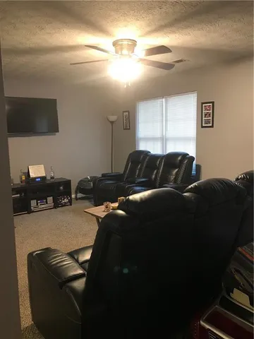 a view of front of house with a yard