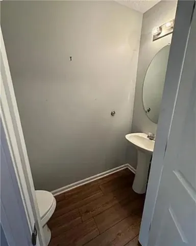a bathroom with a sink and a toilet