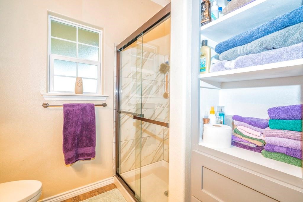 6026 County Road 73 Robstown, TX 78380 - Photo 13 of 30 a bathroom with a sink and a mirror