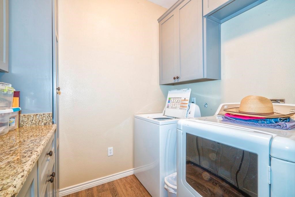 6026 County Road 73 Robstown, TX 78380 - Photo 17 of 30 a utility room with dryer and washer