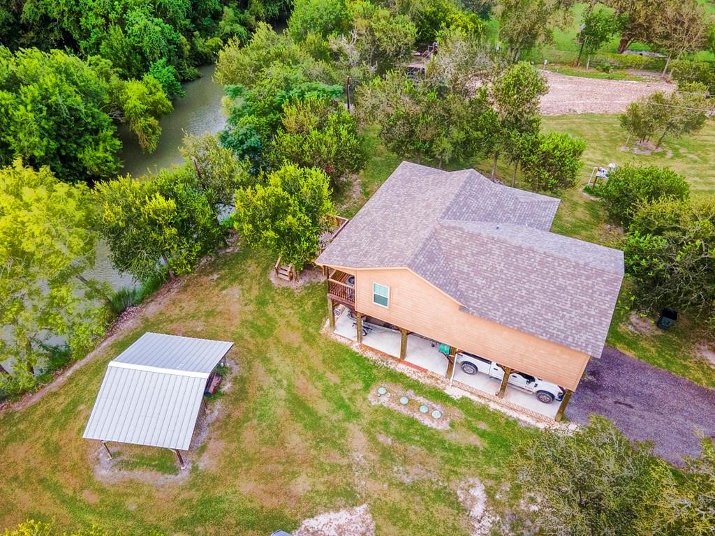 6026 County Road 73 Robstown, TX 78380 - Photo 26 of 30 an aerial view of a house with garden space and street view