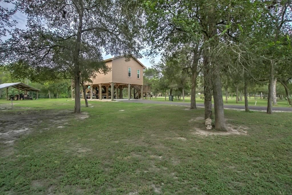 6026 County Road 73 Robstown, TX 78380 - Photo 30 of 30 a view of a house with a yard