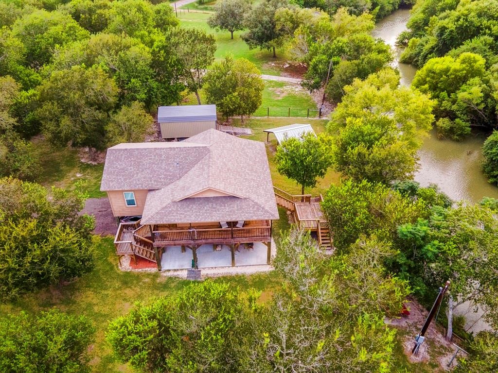 6026 County Road 73 Robstown, TX 78380 - Photo 3 of 30 a backyard of a house with table and chairs