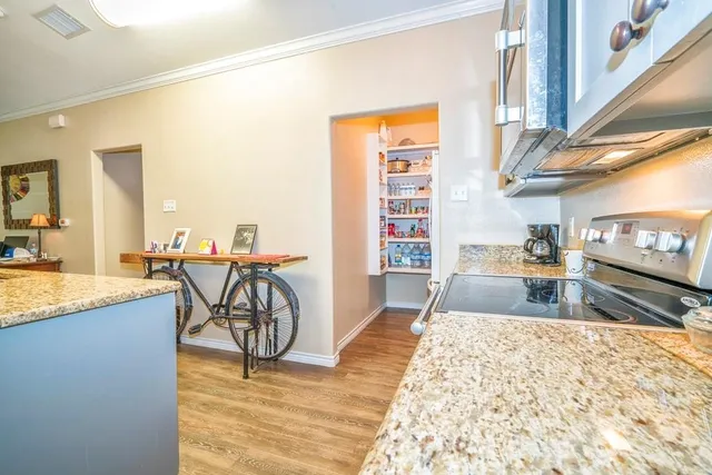 a view of a kitchen and dining area