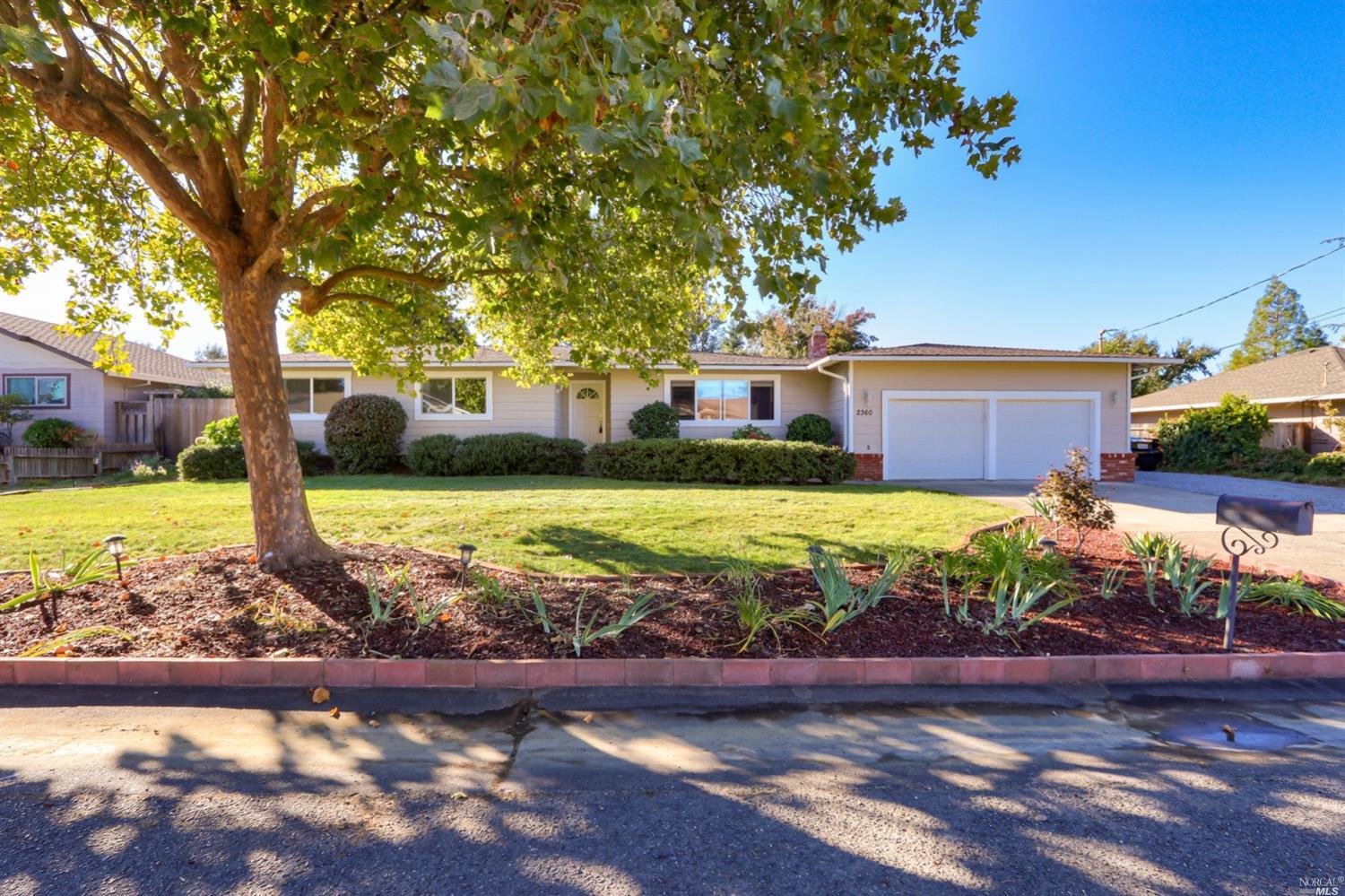2360 Westview Way Santa Rosa, CA 95403 - Photo 1 of 1 a view of a yard with plants and large trees