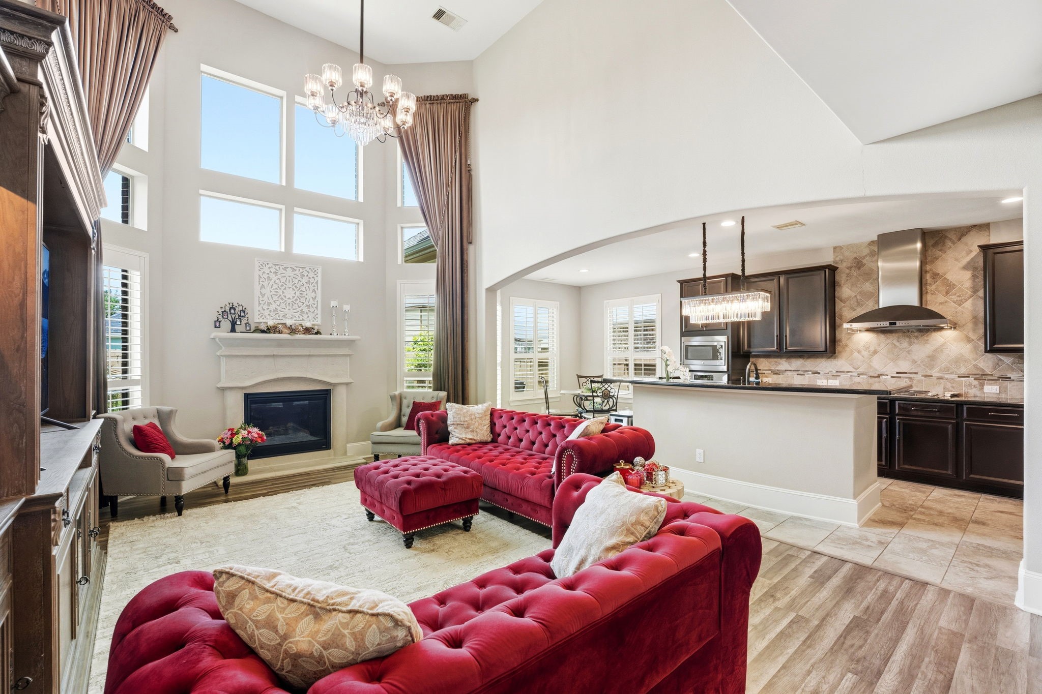 27383 Pendleton Trace Drive Spring, TX 77386 - Photo 11 of 33 High ceilings and 2 story windows with a gas log fireplace.
