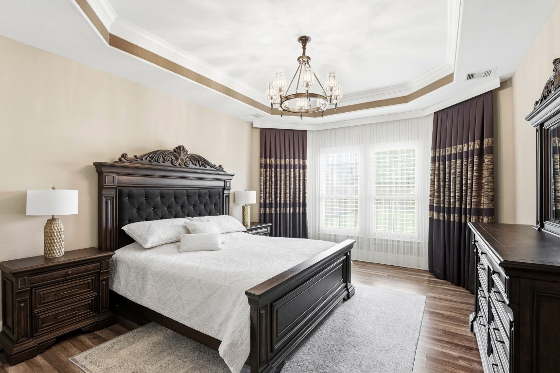 27383 Pendleton Trace Drive Spring, TX 77386 - Photo 13 of 33 Beautiful primary bedroom with coffered ceiling.