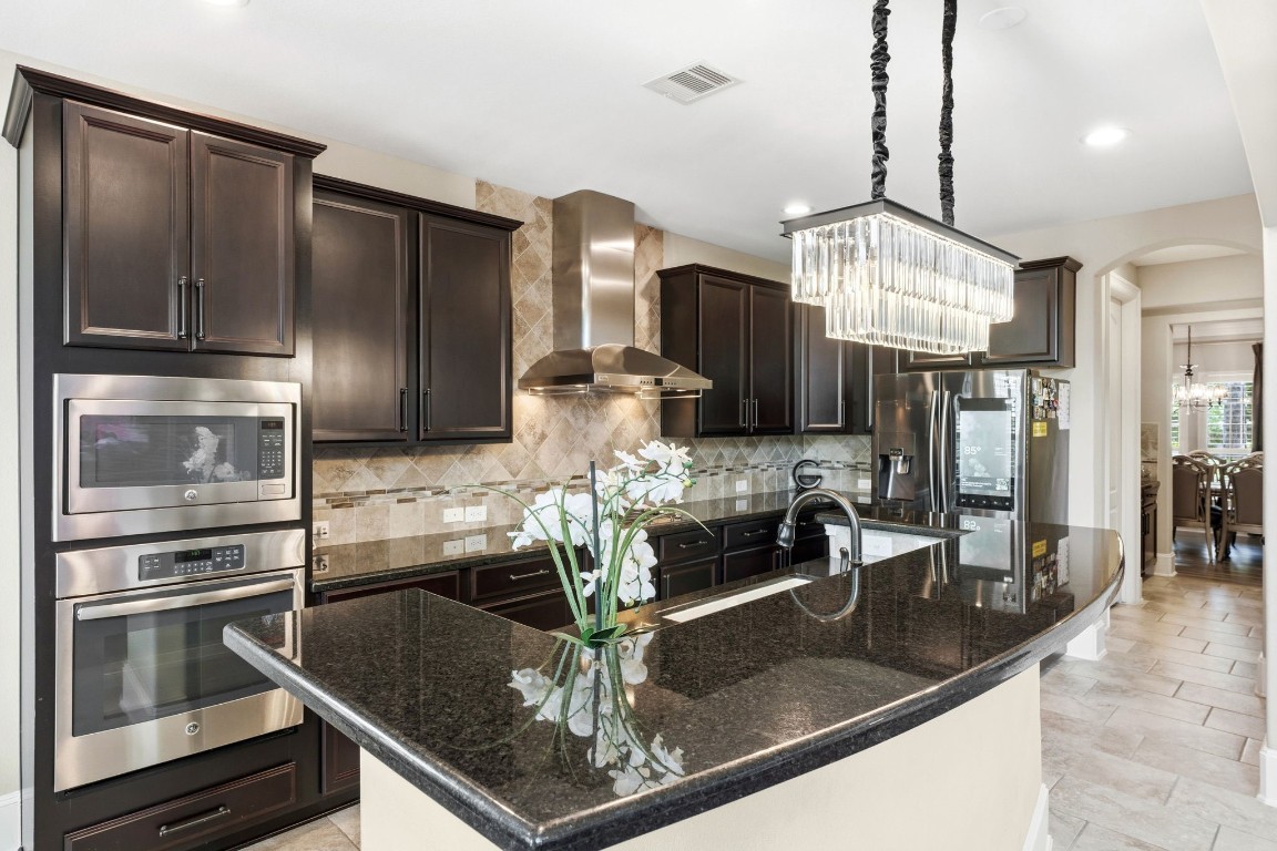 27383 Pendleton Trace Drive Spring, TX 77386 - Photo 7 of 33 Gas stove and stainless steel appliances.