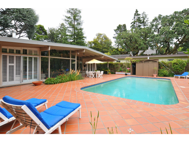 657 Edgewood Road San Mateo, CA 94402 - Photo 14 of 15 a view of a backyard with swimming pool