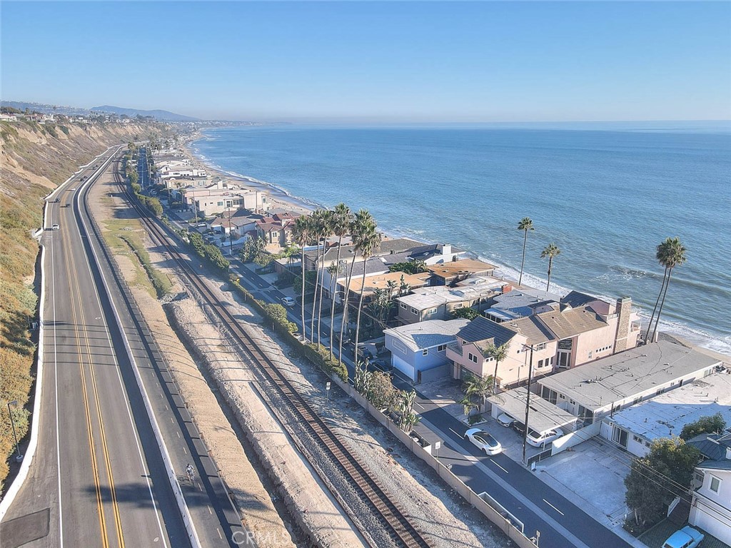 35177 Beach Road Dana Point, CA 92624 - Photo 2 of 66 a view of a terrace with wooden floor and city view