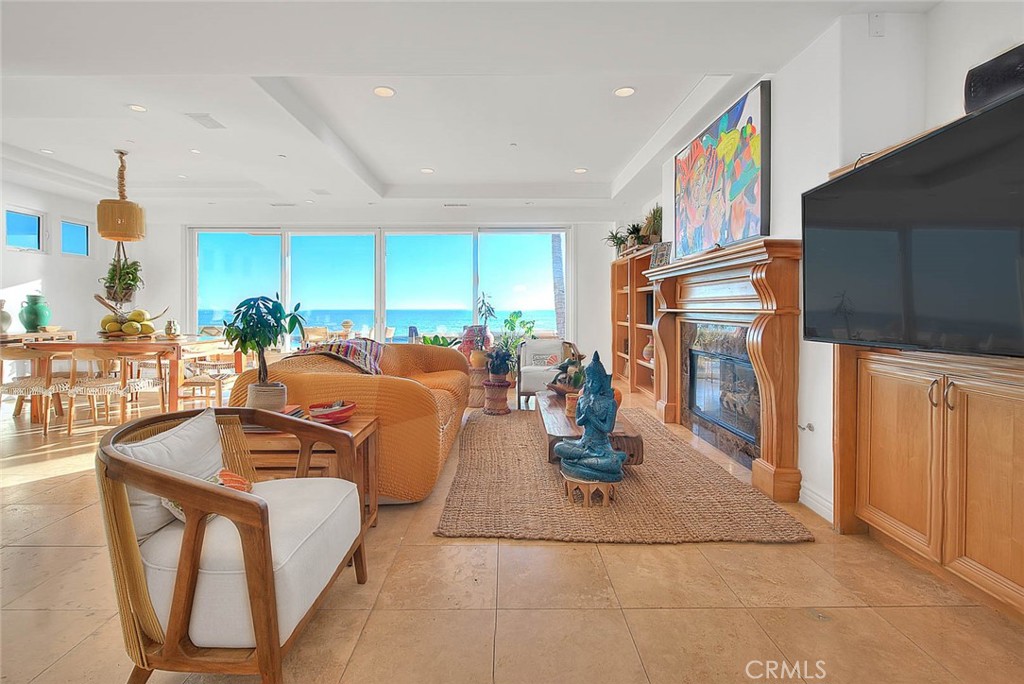 35177 Beach Road Dana Point, CA 92624 - Photo 22 of 66 a living room with furniture a window and kitchen view