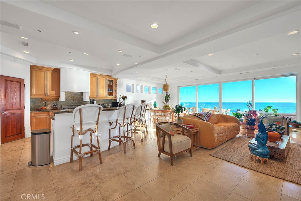 35177 Beach Road Dana Point, CA 92624 - Photo 24 of 66 a room with lots of chairs and mirrors