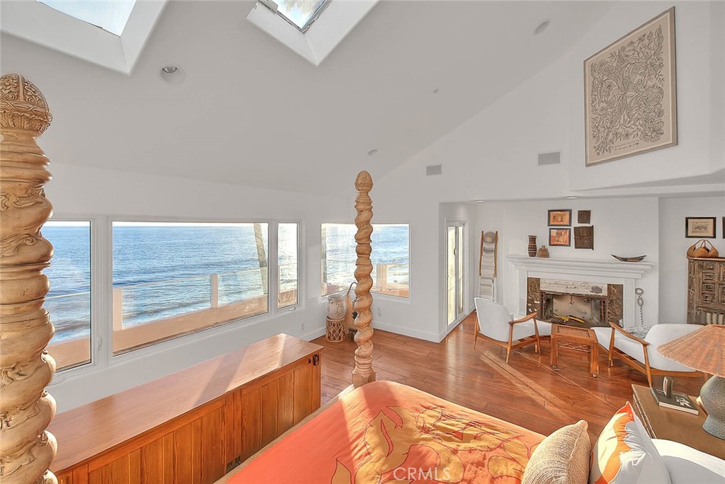 35177 Beach Road Dana Point, CA 92624 - Photo 31 of 66 a living room with furniture and a fireplace