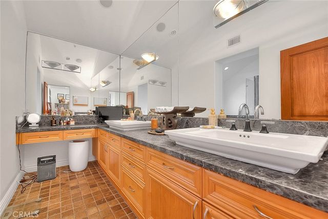 a bathroom with a shower and a bath tub