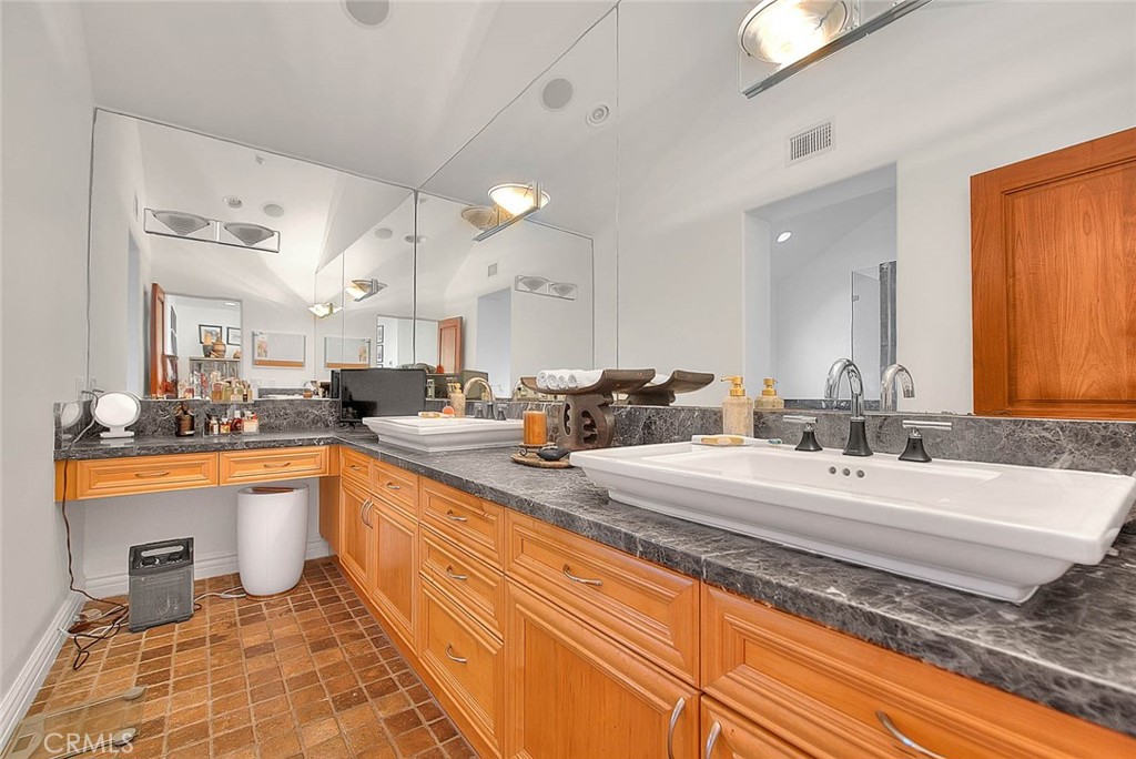 35177 Beach Road Dana Point, CA 92624 - Photo 34 of 66 a large bathroom with a large tub and sink