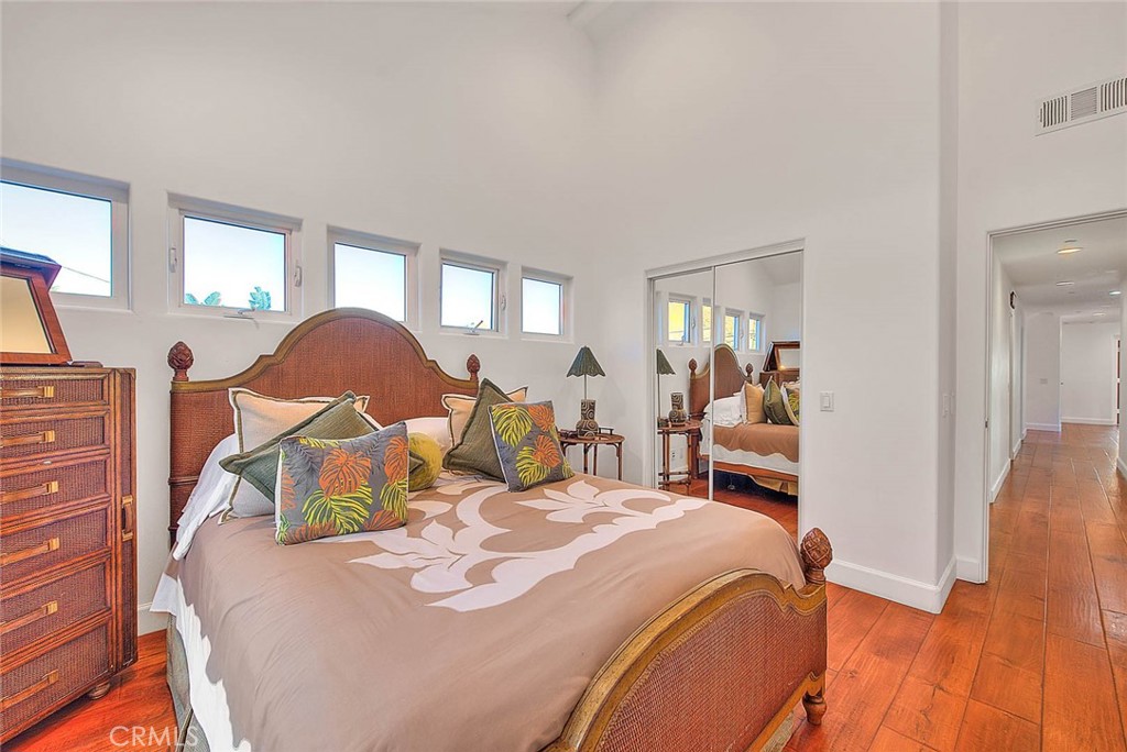 35177 Beach Road Dana Point, CA 92624 - Photo 38 of 66 a bed room with a bed and a chair