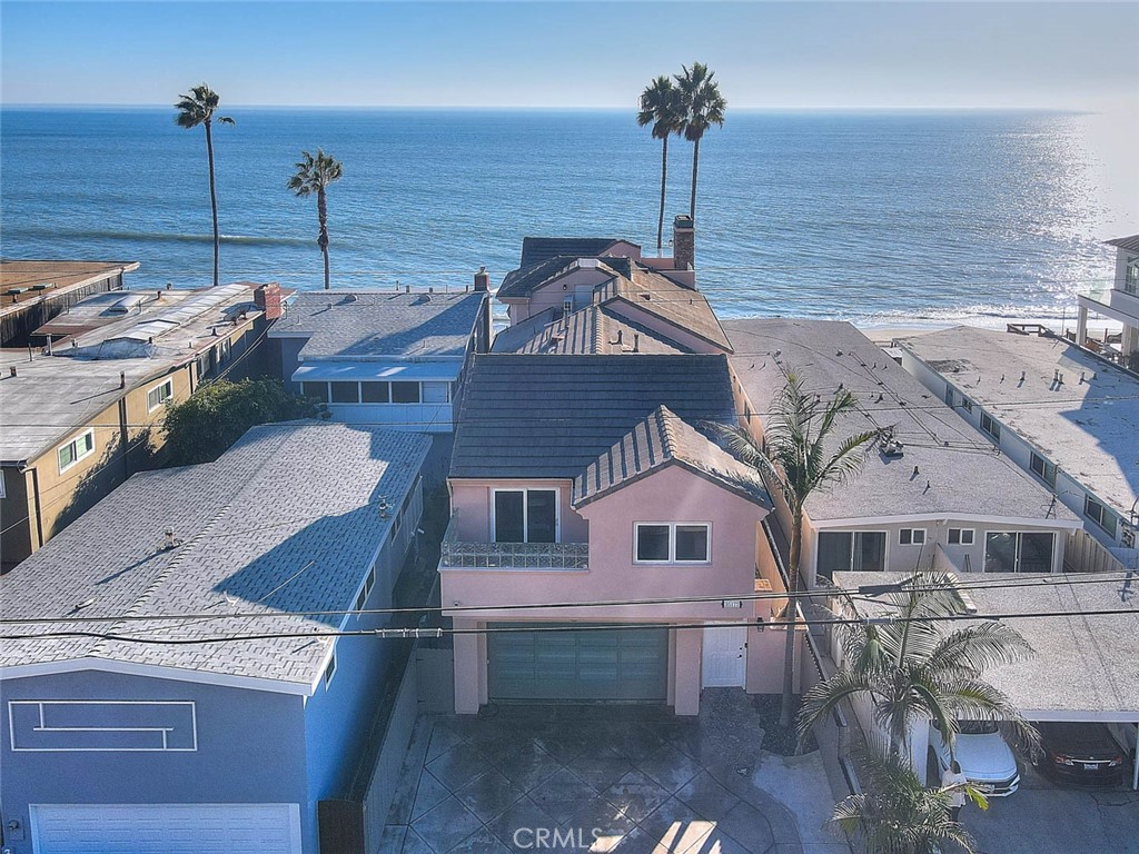 35177 Beach Road Dana Point, CA 92624 - Photo 5 of 66 a view of a house with a roof deck