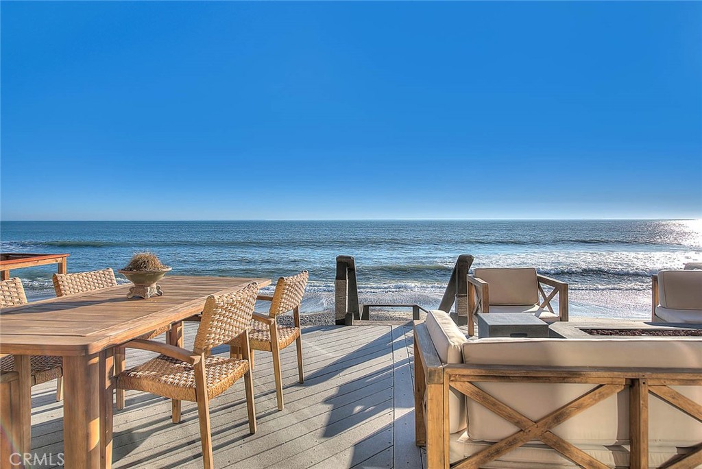 35177 Beach Road Dana Point, CA 92624 - Photo 53 of 66 a view of table and chairs in balcony