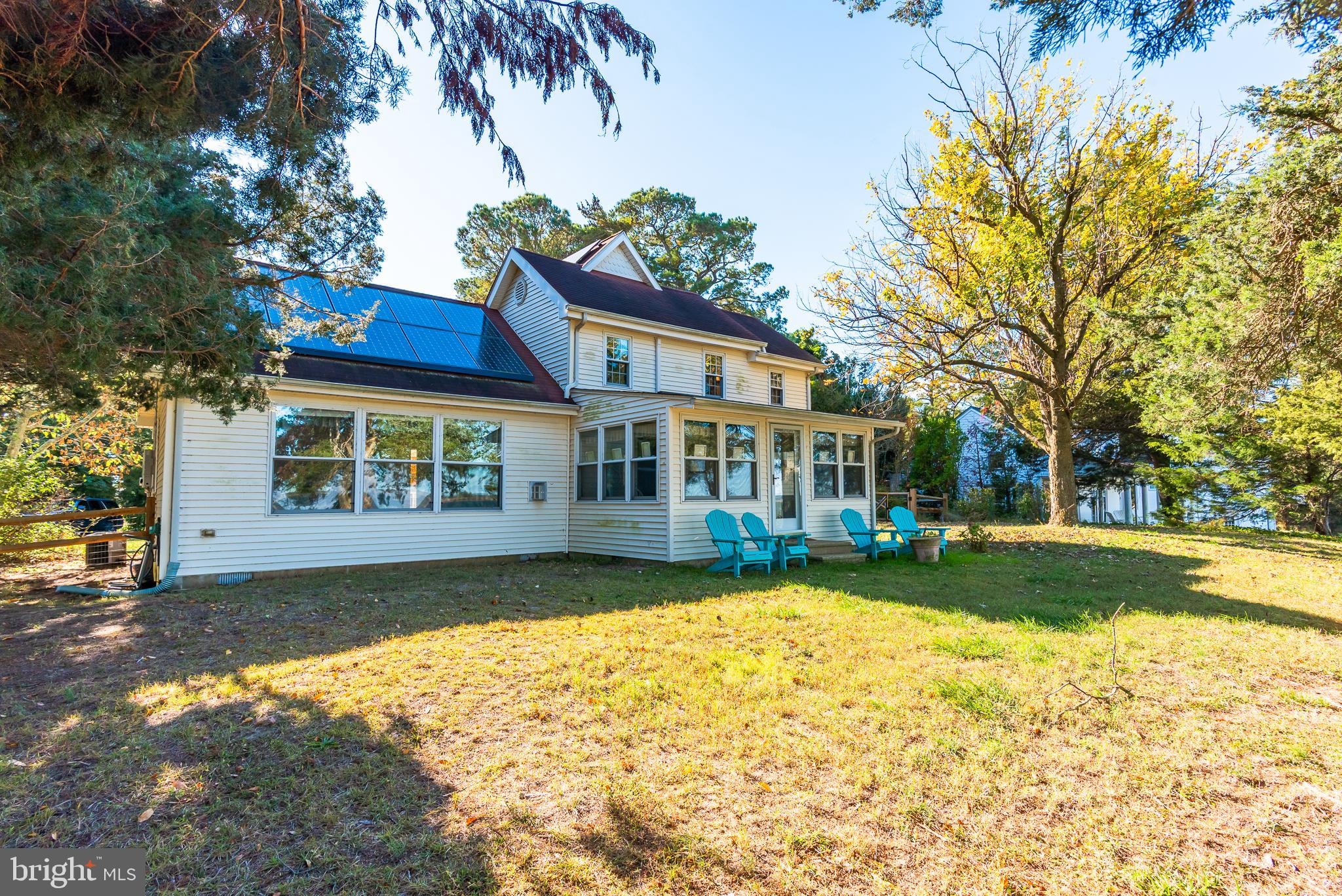 26388 Mt Vernon Road Princess Anne, MD 21853 - Photo 15 of 43 a front view of a house with a yard