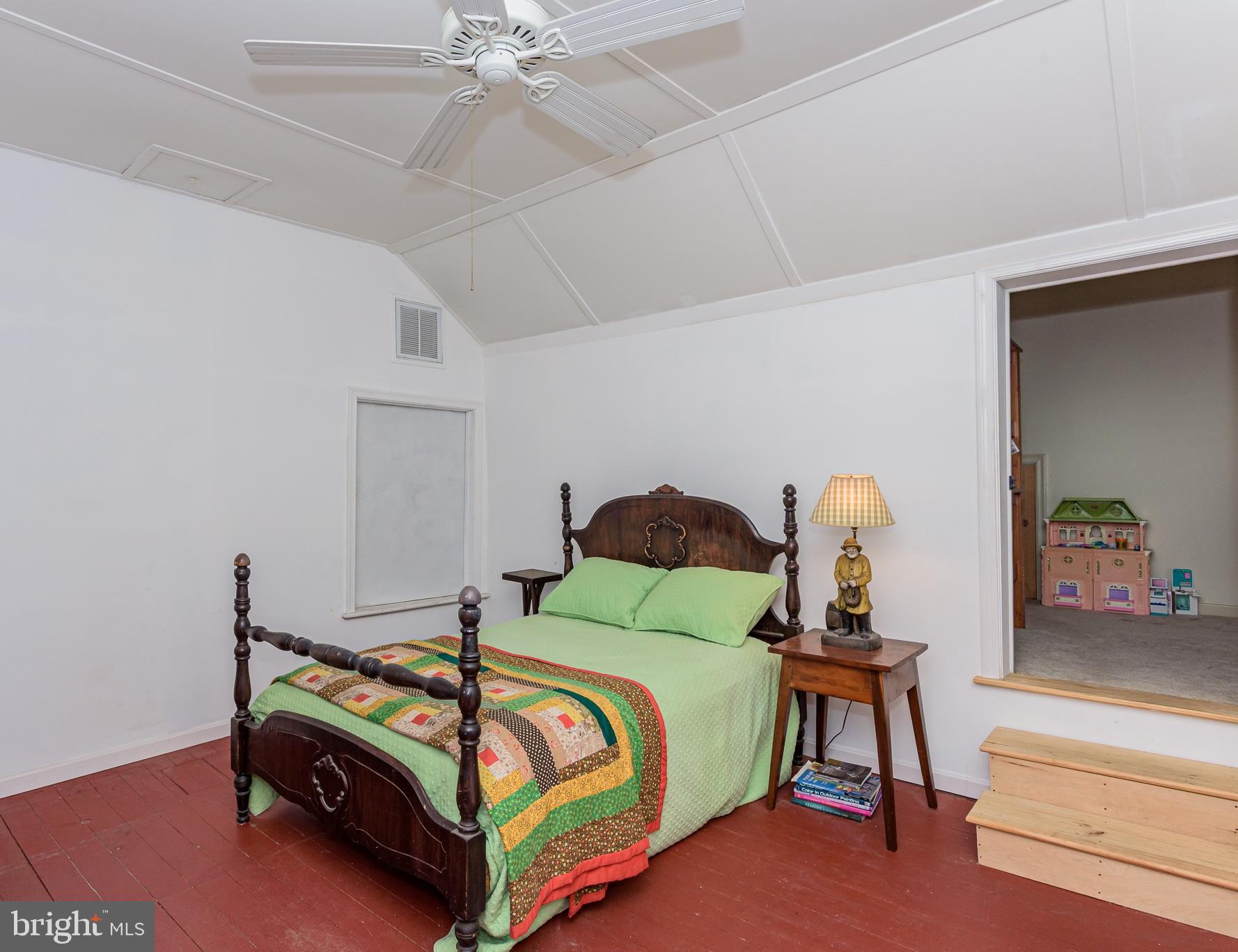 26388 Mt Vernon Road Princess Anne, MD 21853 - Photo 40 of 43 a bedroom with a bed and next to a window