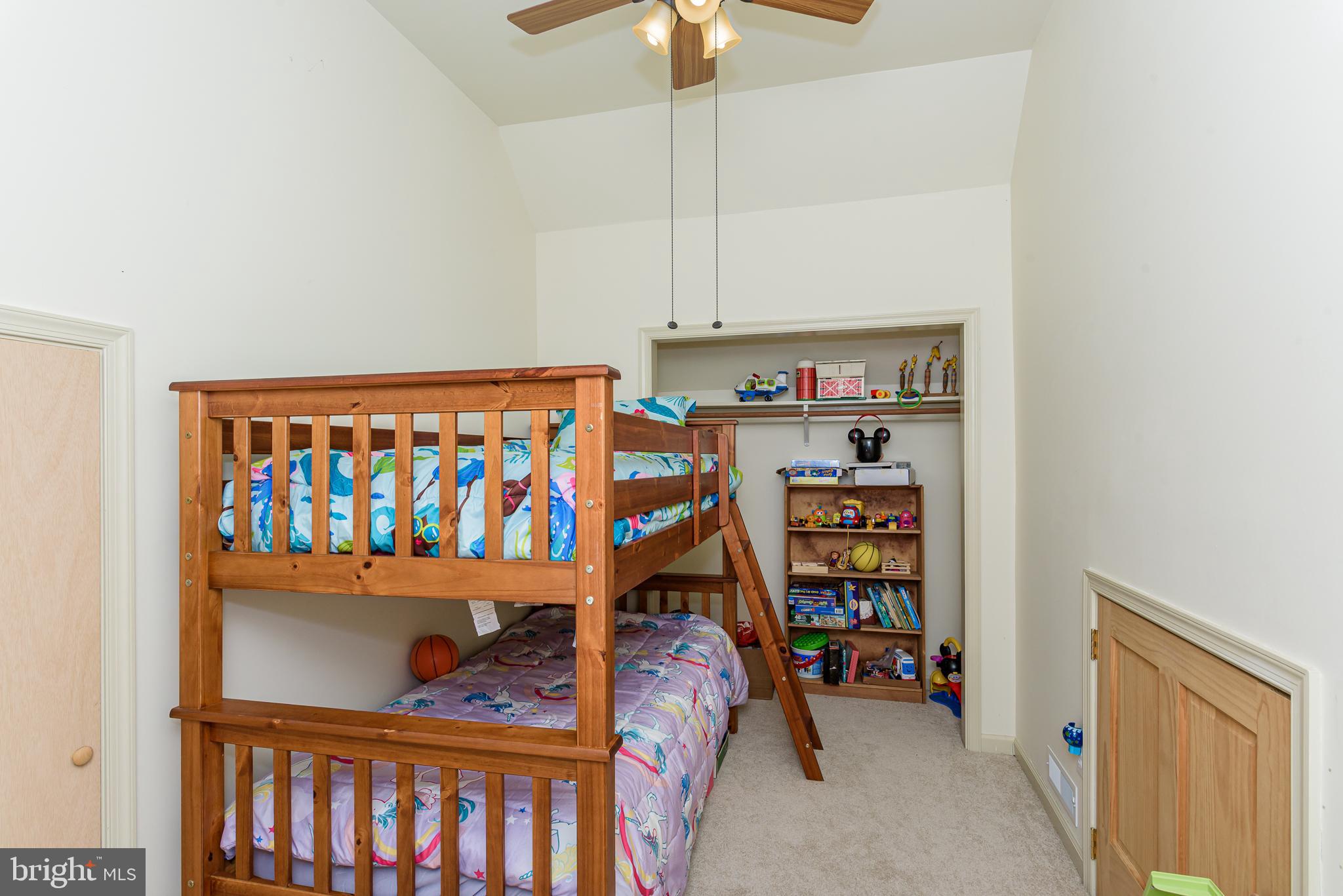 26388 Mt Vernon Road Princess Anne, MD 21853 - Photo 42 of 43 a bedroom with baby crib and hanging chair