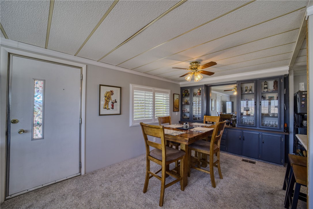 4826 Powell Lake Road Topock, AZ 86436 - Photo 10 of 58 a dining room with furniture and window