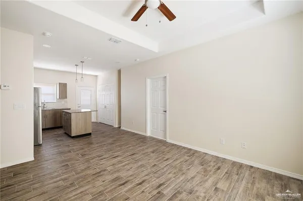 a view of an empty room and window