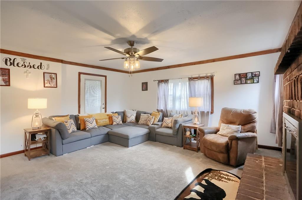 1923 Martin Road New Castle, PA 16101 - Photo 3 of 25 a living room with furniture and a large window