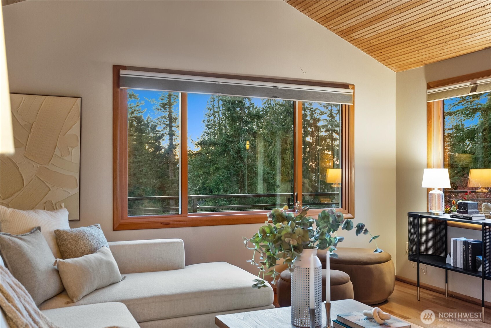 18431 High Street Edmonds, WA 98020 - Photo 12 of 40 a living room with furniture and a large window