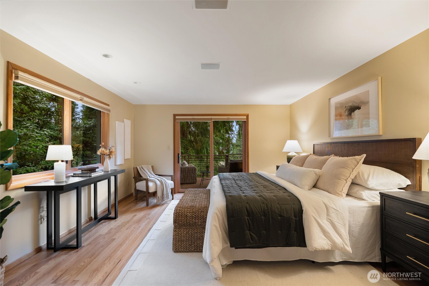 18431 High Street Edmonds, WA 98020 - Photo 16 of 40 a bedroom with a bed and a large window