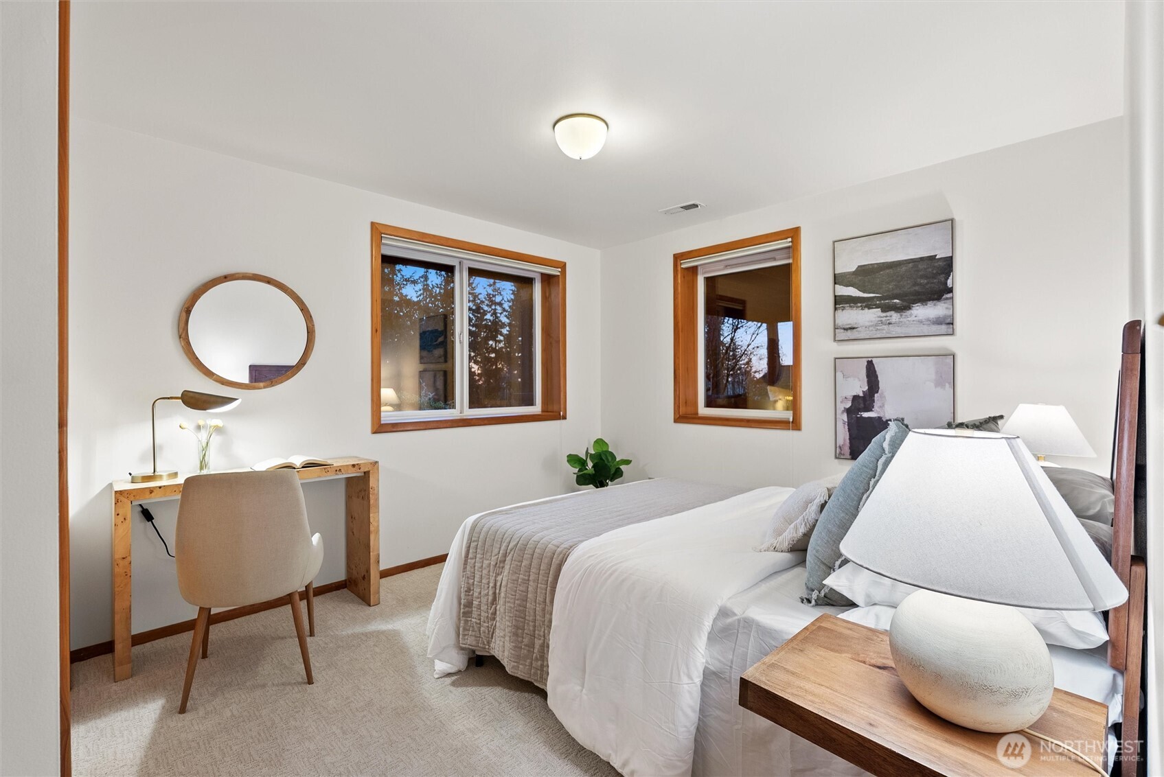 18431 High Street Edmonds, WA 98020 - Photo 23 of 40 a bedroom with a bed window and chair