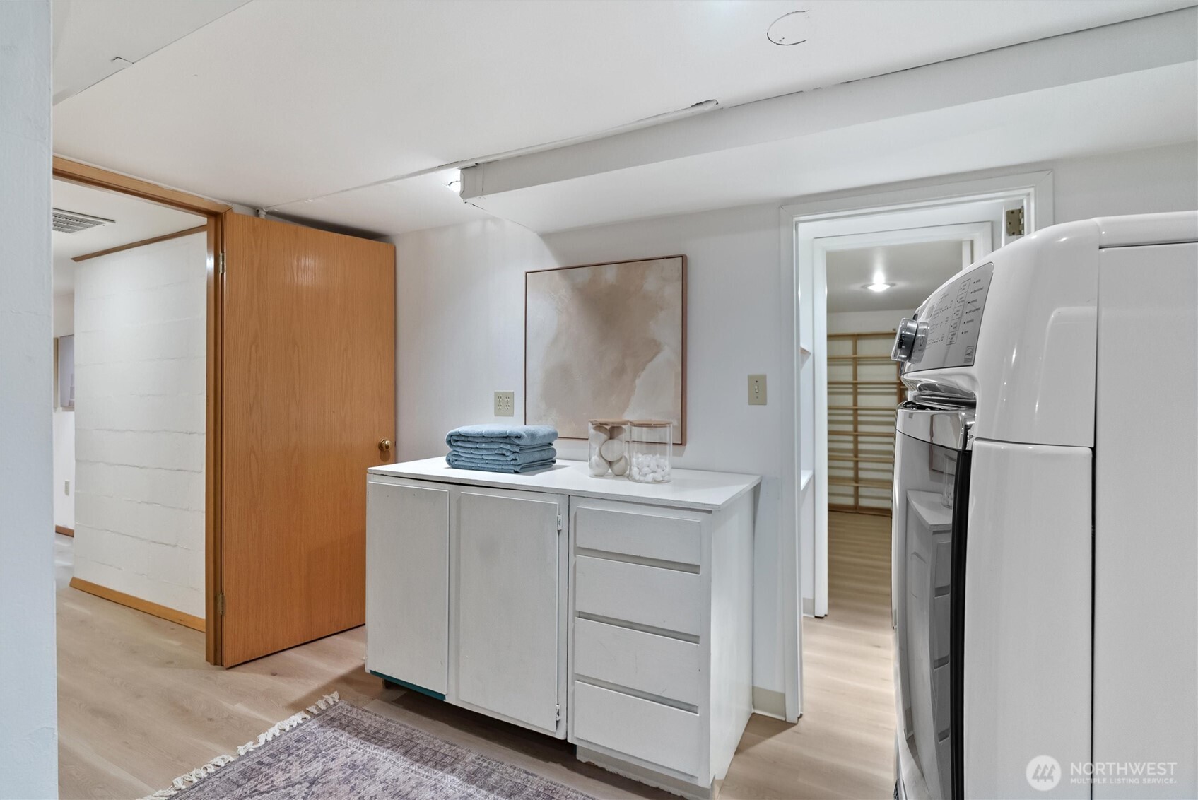 18431 High Street Edmonds, WA 98020 - Photo 31 of 40 a bathroom with a granite countertop sink and a mirror