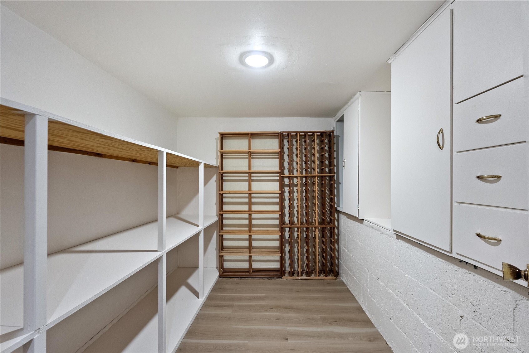 18431 High Street Edmonds, WA 98020 - Photo 33 of 40 a view of walk in closet with empty racks