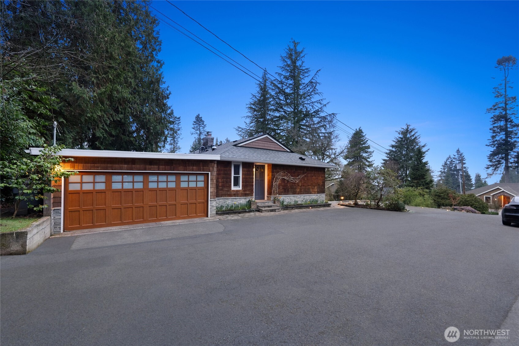 18431 High Street Edmonds, WA 98020 - Photo 36 of 40 a front view of a house with a yard and tree