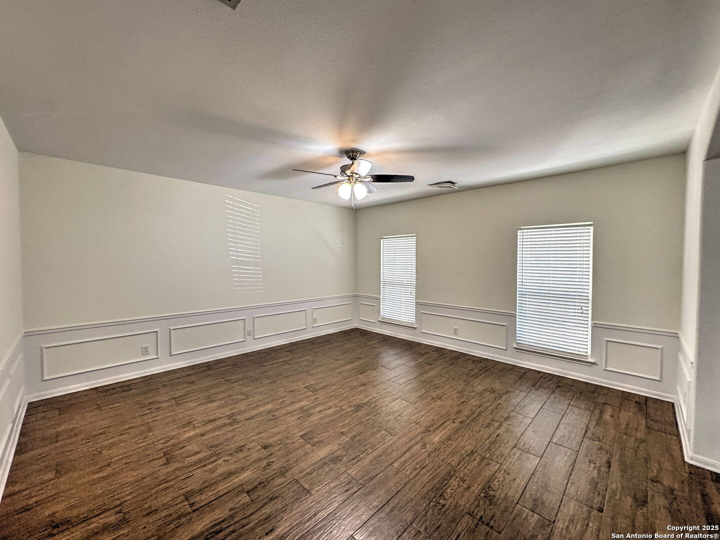 8711 Sandia Circle Helotes, TX 78023 - Photo 17 of 40 a view of a livingroom with wooden floor